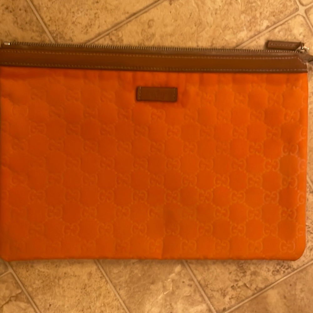 Orange Gucci cloth clutch-Approximately 12” x 8.50” x .25”